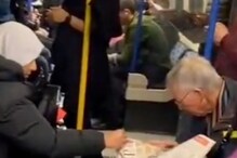 WATCH: Stranger Helps Elderly Man With Parkinson’s Disease Struggling to Flip Newspaper Page