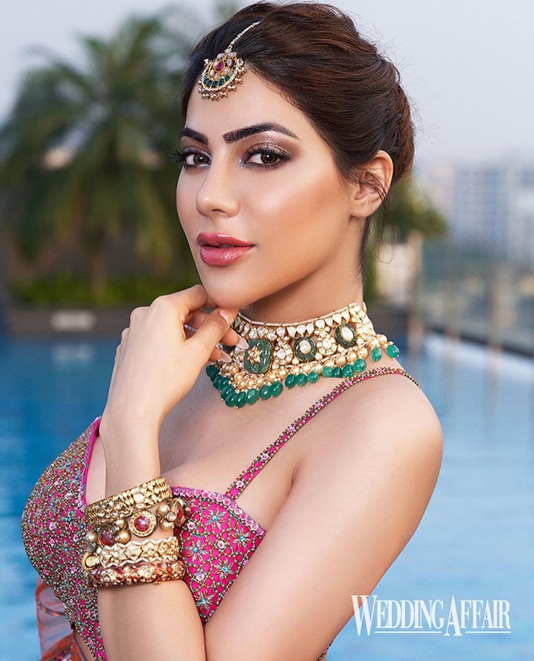 Nikki Tamboli Latest Video: Nikki Tamboli gives Indian saree a twist by  sporting blouse with plunging neckline and heavy jewellery, See PHOTOS