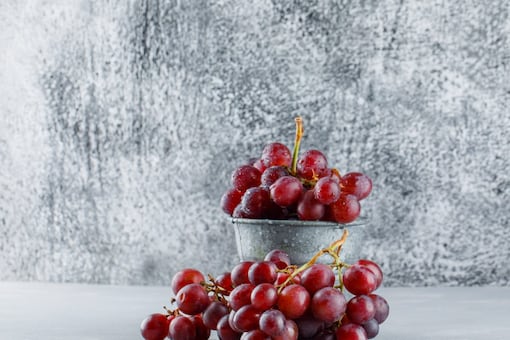 Red grapes contain an ingredient that helps in reducing the effects of ageing. It may also slow the production of free radicals that are harmful. 