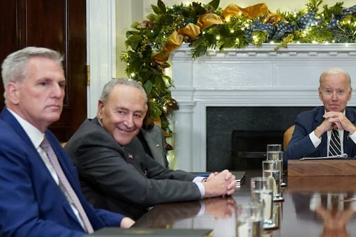 Biden is expected to urge the US House Speaker Kevin McCarthy (far-left) to raise the debt ceiling and avoid US from slipping into default (Image: Reuters)