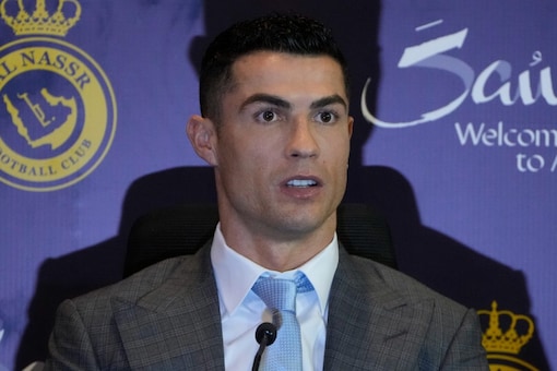 Cristiano Ronaldo attends a press conference for his official unveiling as a new member of Al Nassr soccer club in in Riyadh, Saudi Arabia, Tuesday, Jan. 3, 2023. Ronaldo, who has won five Ballon d'Ors awards for the best soccer player in the world and five Champions League titles, will play outside of Europe for the first time in his storied career. (AP Photo/Amr Nabil)