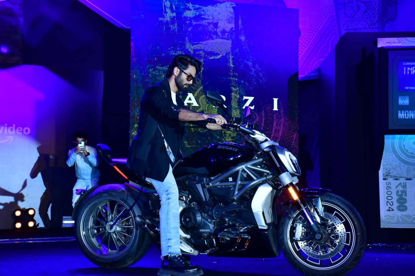 Shahid Kapoor Rides Bike Vijay Sethupathi Makes Glass Shattering Entry At Farzi Trailer Launch