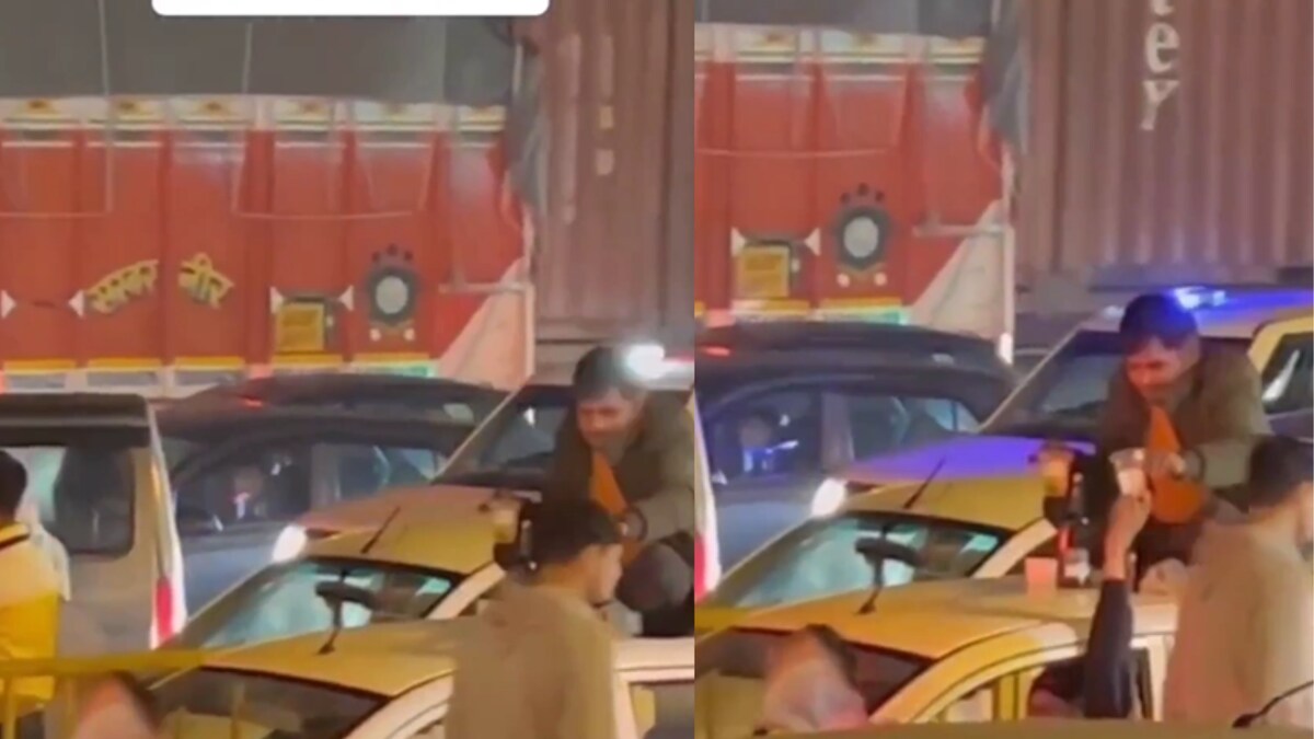Whisky Business Man Drinks Alcohol on Car Roof in Gurugram Traffic