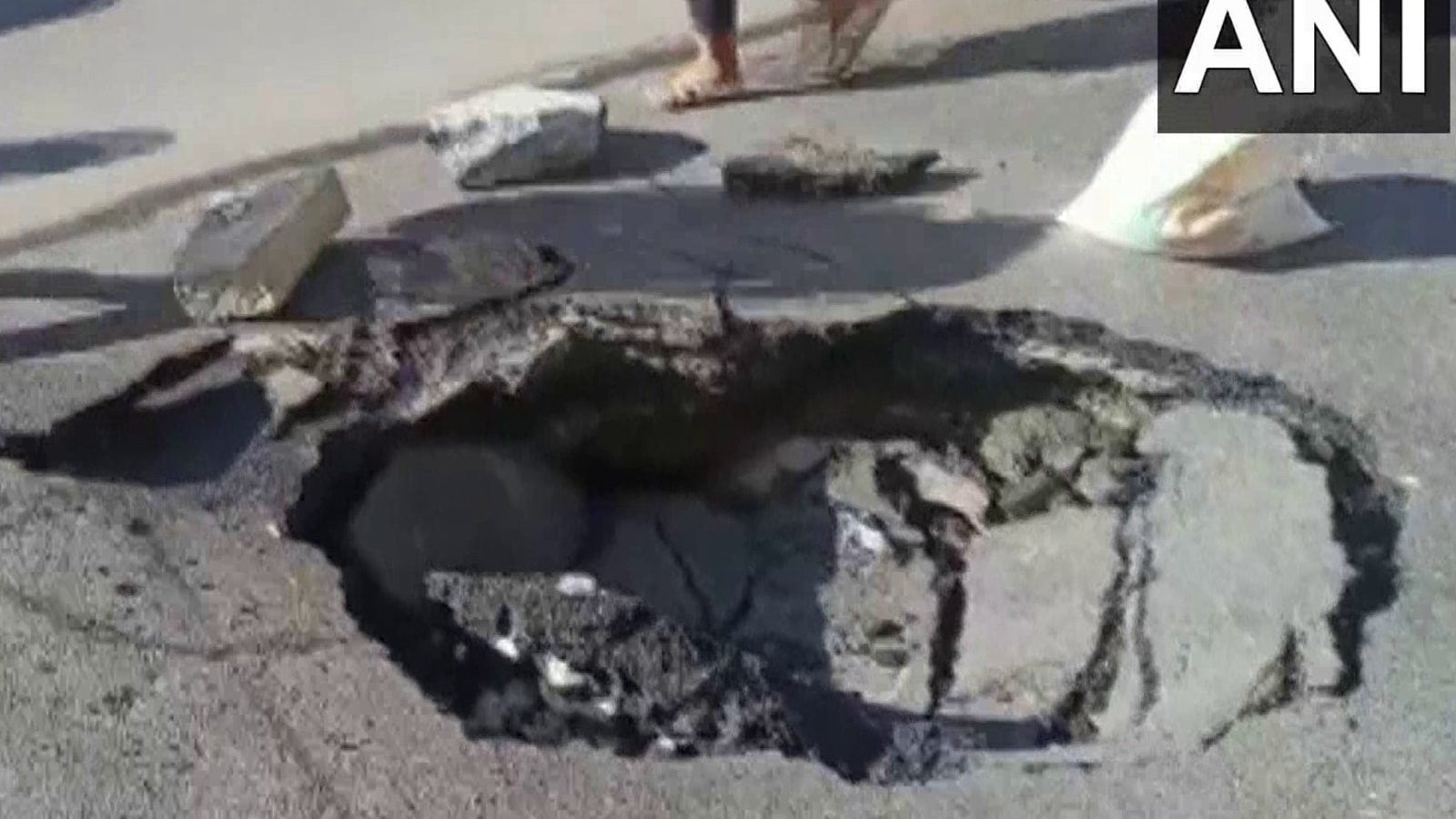 Portion of Road Caves in at Mahalakshmi Layout in Bengaluru Portion of Road Caves in at Mahalakshmi Layout in Bengaluru
