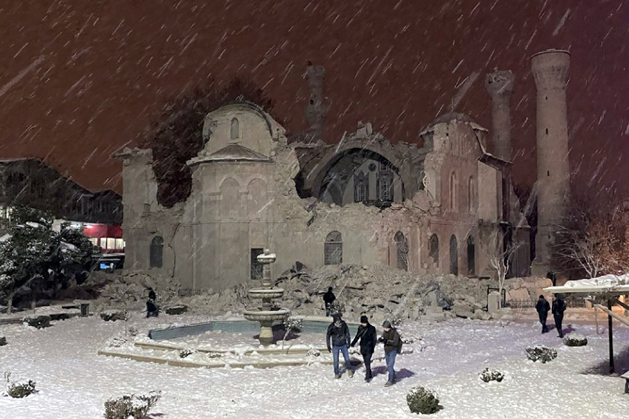 The UN cultural agency UNESCO expressed fears over heavy damage in two cities on its heritage list -- Aleppo in Syria and Diyarbakir in Turkey.
People walk next to a mosque destroyed by an earthquake in Malatya, Turkey, Monday, Feb. 6, 2023. (DIA images via AP)
The UN cultural agency UNESCO expressed fears over heavy damage in two cities on its heritage list -- Aleppo in Syria and Diyarbakir in Turkey.
People walk next to a mosque destroyed by an earthquake in Malatya, Turkey, Monday, Feb. 6, 2023. (DIA images via AP)