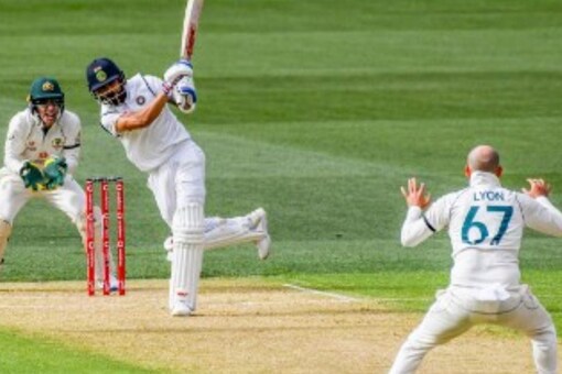 Virat Kohli playing shot against Nathan Lyon