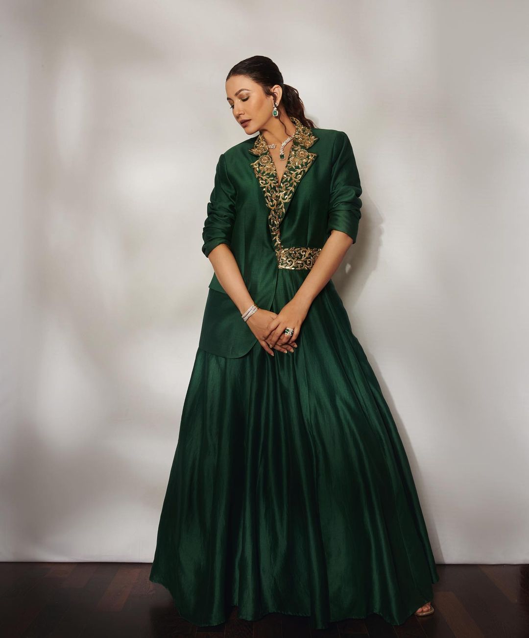 Gauahar Khan looks chic in a green Indo-western ensemble. 