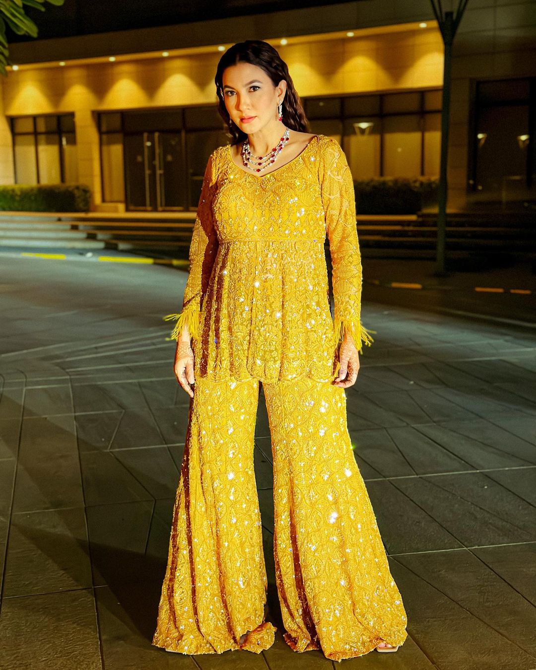 Gauahar Khan looks vibrant in an embellished yellow sharara set. 