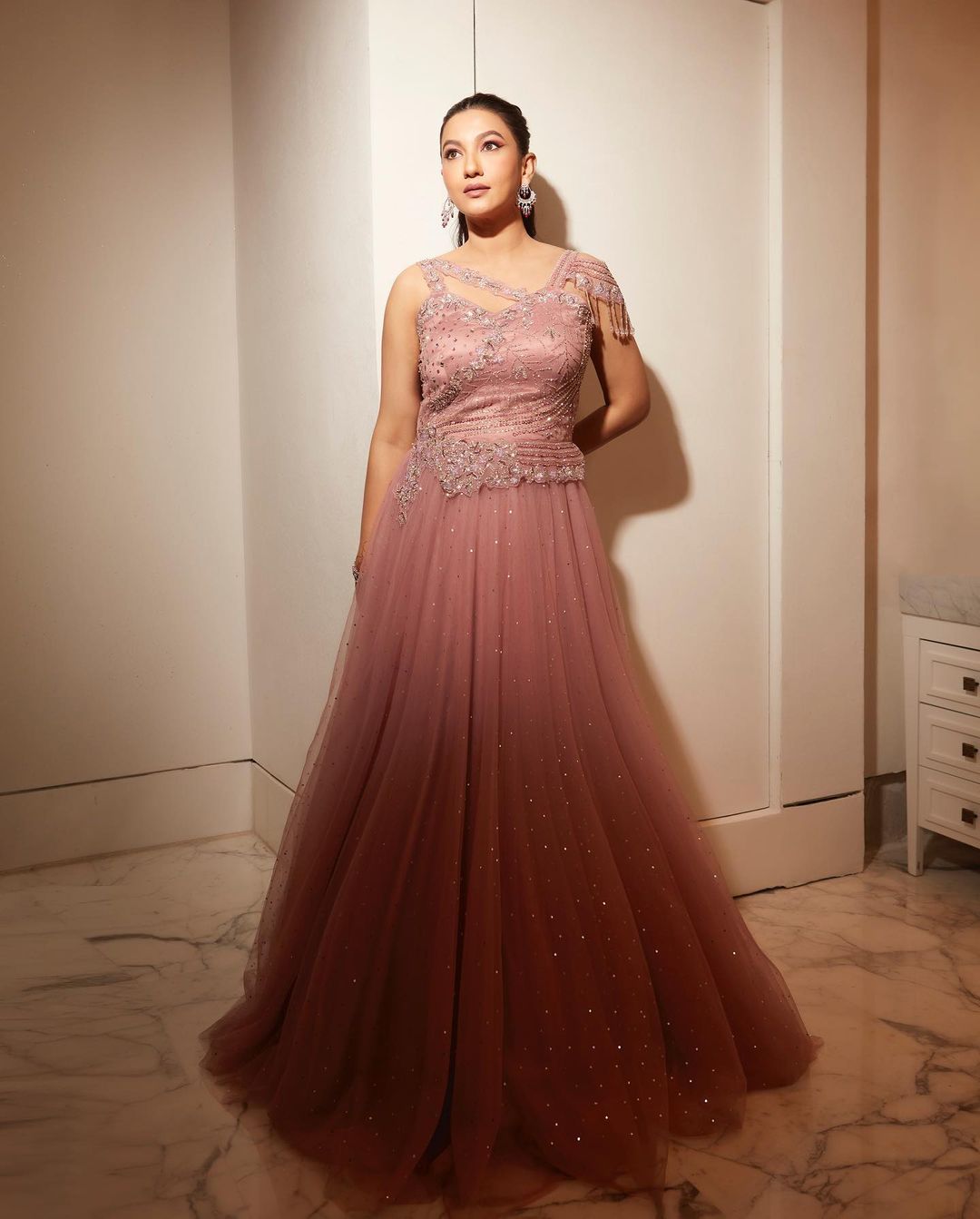 Gauahar Khan gives princess vibes in a peach tulle gown. 