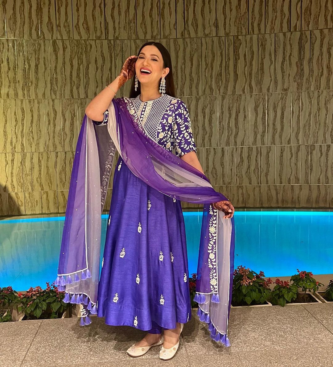 Gauahar Khan looks pretty in a purple kurta set. 