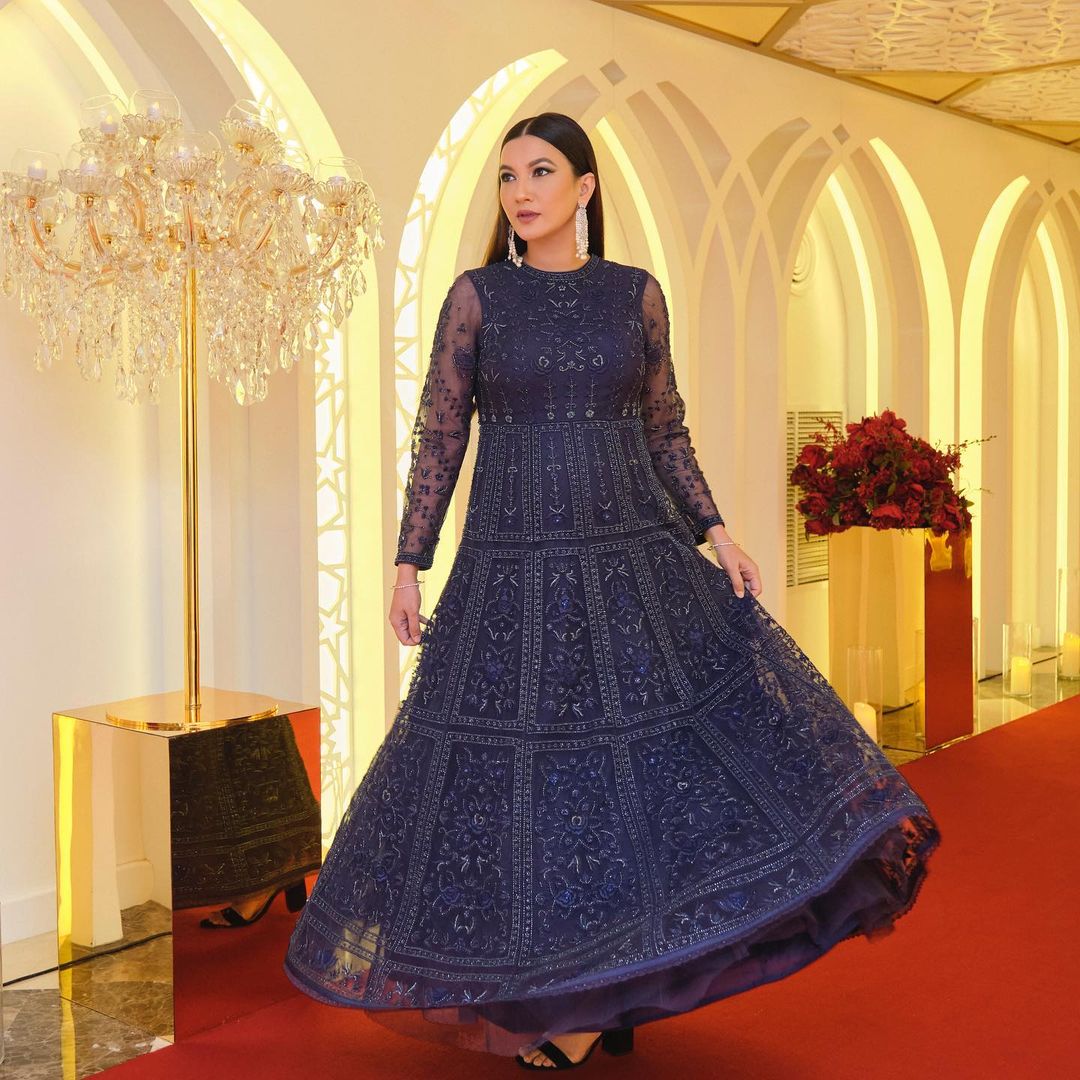 Gauahar Khan cuts a statusque figure in a blue dress. 