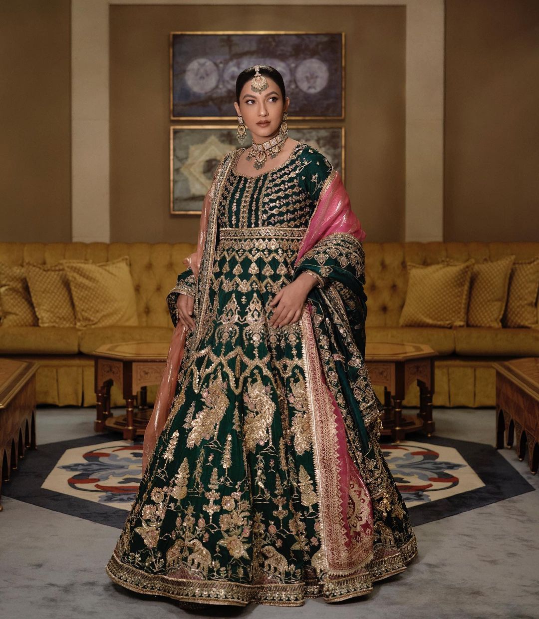 Gauahar Khan looks gorgeous in an ornate green and golden floor-length anarkali.