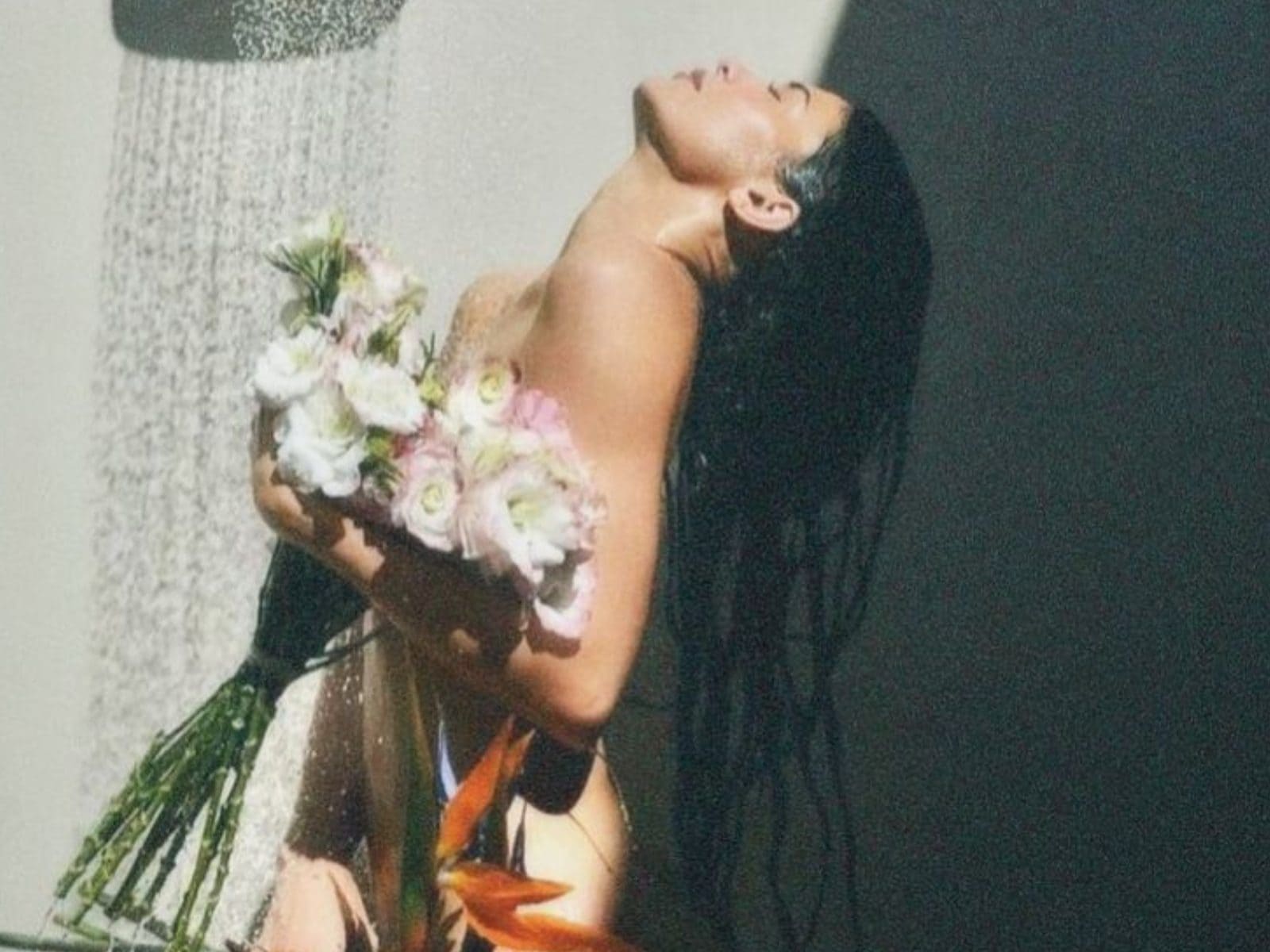 Kylie Jenner turns up the heat in tiny metallic pink bikini: See pics