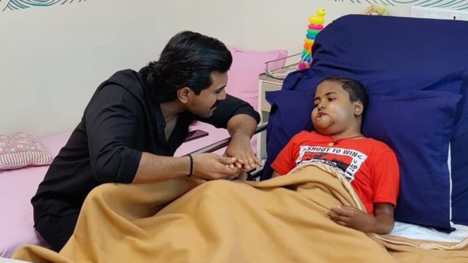 Ram Charan visits a 9-year-old cancer patient, see pics