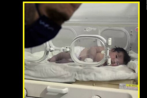 The newborn found under rubble was rushed to the hospital for medical support. (Image source: Twitter/@nowthisnews)