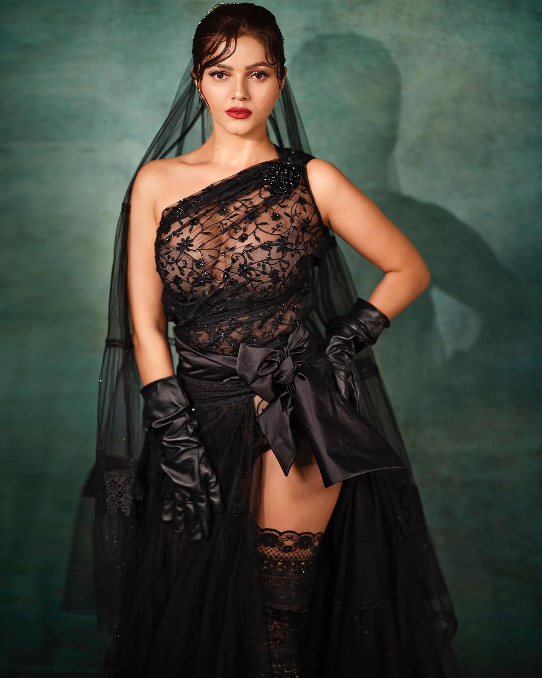Rubina Dilaik looks fabulous in the black one-shoulder dress with a matching veil. (Image: Instagram) Rubina Dilaik looks fabulous in the black one-shoulder dress with a matching veil.