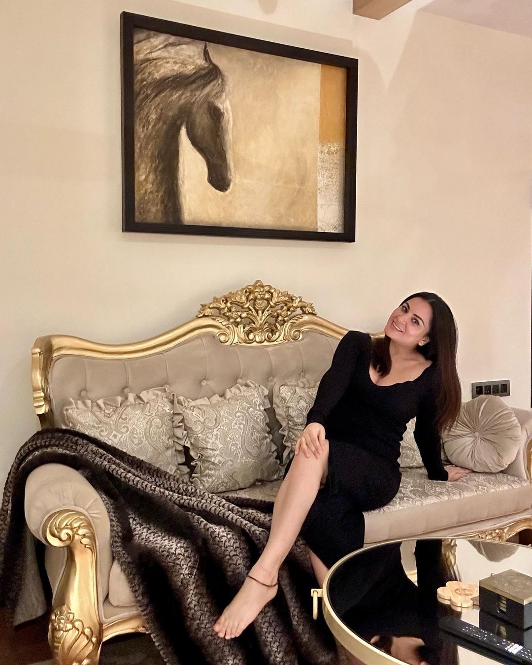 Shraddha Arya's house gives regal vibes with the gold accented furniture and standout art pieces. 