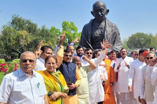 OBC MPs of BJP hold protest in front of Gandhi statue at Parliament premise, demanding an apology from Congress leader Rahul Gandhi over his 'Modi surname' remark