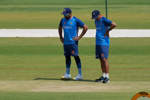 Rahul Dravid and Rohit Sharma assessing the Ahmedabad track during a practice session (AP Photo)