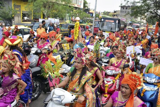 Nagpur: Maharashtrian women wearing tradional clothes participate in a procession on the eve of 'Gudi Padwa' on Tuesday. (PTI)