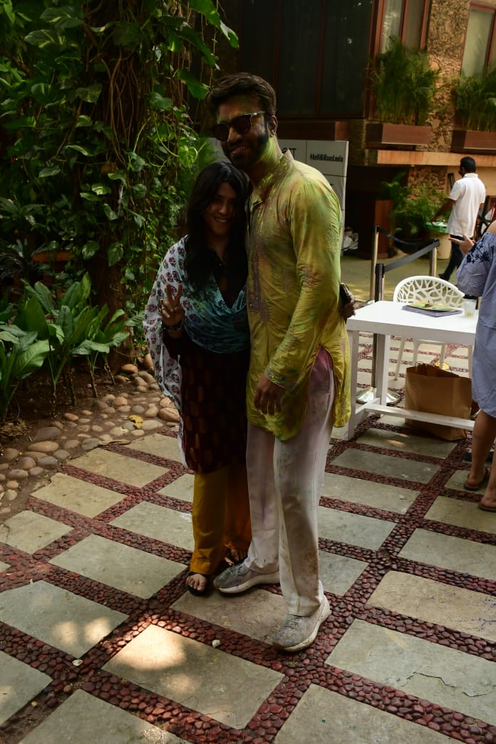 Ekta Kapoor poses with Vicky Jain at the latter's Holi bash. 
