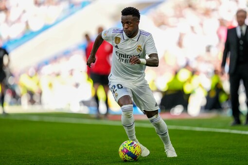 Real Madrid's Vinicius Junior controls the ball during a Spanish La Liga soccer match between Real Madrid and Espanyol at the Santiago Bernabeu stadium in Madrid, Spain, Saturday, March 11, 2023. (AP Photo/Bernat Armangue)