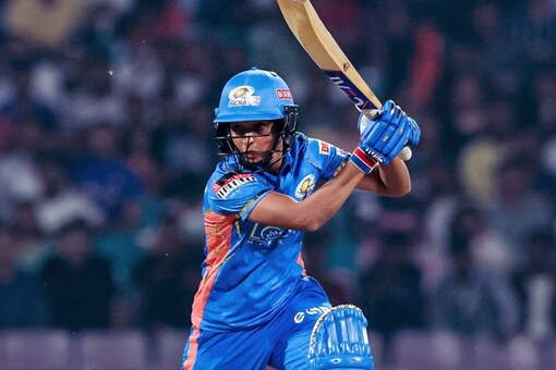 Mumbai Indians captain Harmanpreet Kaur plays a shot during WPL 2023 opener