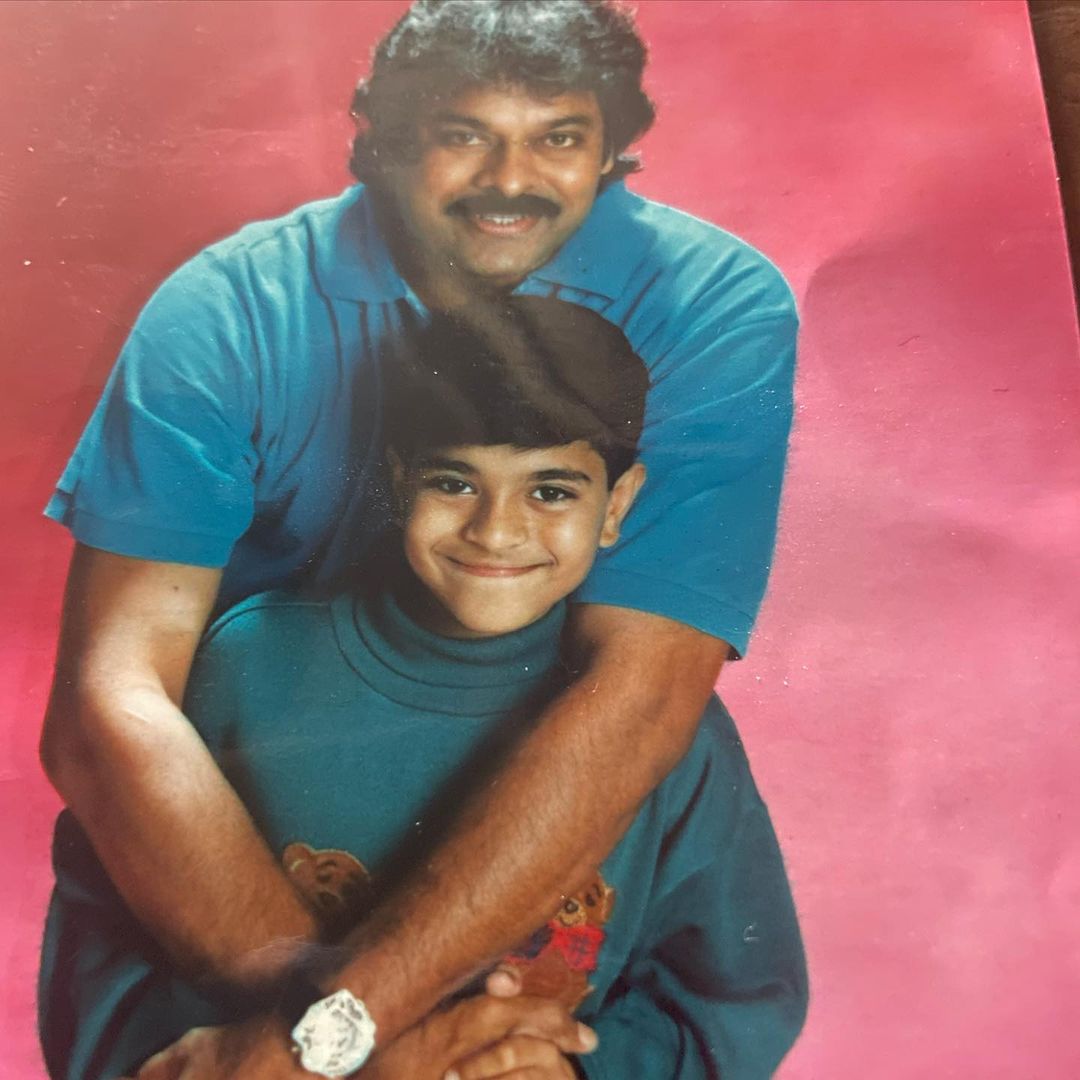 It seems that Chiranjeevi and Ram Charan’s twinning tradition began ever since he was a little boy. In this throwback still, the father-son duo look happy together in matching blue attires. (Image: Instagram)