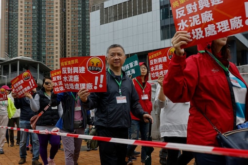 Protesters demonstrate against a land reclamation project during one of the first demonstrations to be formally approved since the enactment of the national security law, in Hong Kong (Image: Reuters)