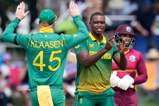 WI v SA: South Africa's Lungi Ngidi celebrates with Heinrich Klaasen after dismissing West Indies's Brandon King (AP)