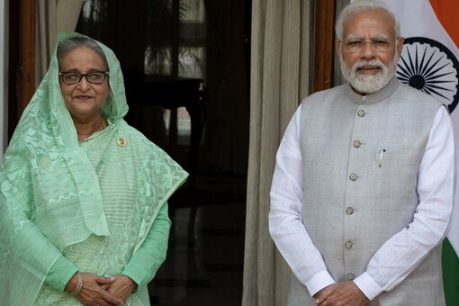 Prime Minister Narendra Modi and his Bangladesh counterpart Sheikh Hasina pose during a photo opportunity ahead of their meeting at Hyderabad House in New Delhi, Sept 6, 2022. (Photo Credit: Reuters)