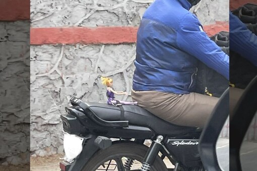 Desi Man Giving a Bike Ride to a ‘Barbie Doll’ Has Users Asking Why (Photo Credits: Twitter/@KabirTaneja)