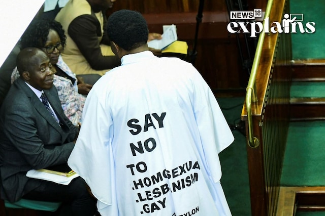 Member of Parliament from Bubulo contituency John Musira dressed in an anti gay gown attends the debate of the Anti-Homosexuality bill inside the chambers, in Kampala, Uganda March 21, 2023.  (Image: Reuters)