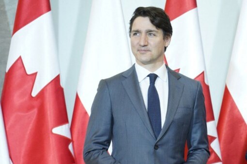 Canadian Prime Minister Justin Trudeau poses for a photo in Warsaw on March 10, 2022. (AFP)