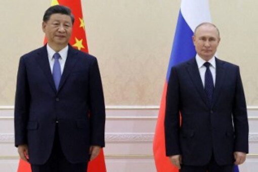 China's President Xi Jinping and Russian President Vladimir Putin pose during their meeting on the sidelines of the Shanghai Cooperation Organisation (SCO) leaders' summit in Samarkand. (AFP)