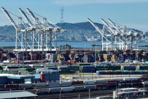 In an aerial view, cranes stand at the Port of Oakland on March 02, 2023 in Oakland, California. (AFP)