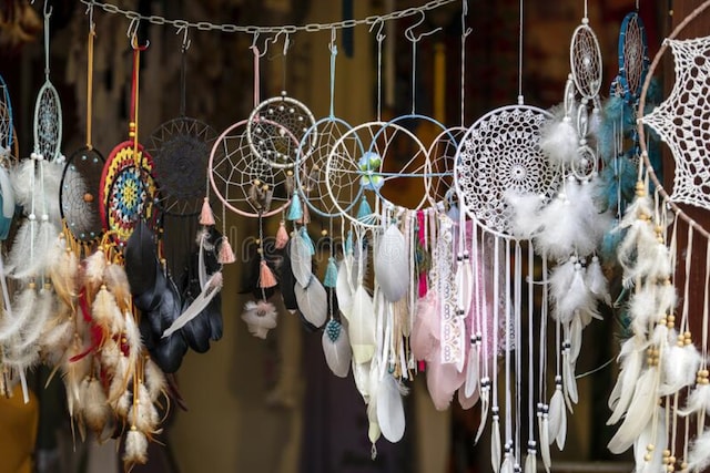 The dreamcatcher can act as a potent reminder of our connection to the cosmos and the power of our own thoughts because of its elaborate design and calming colours