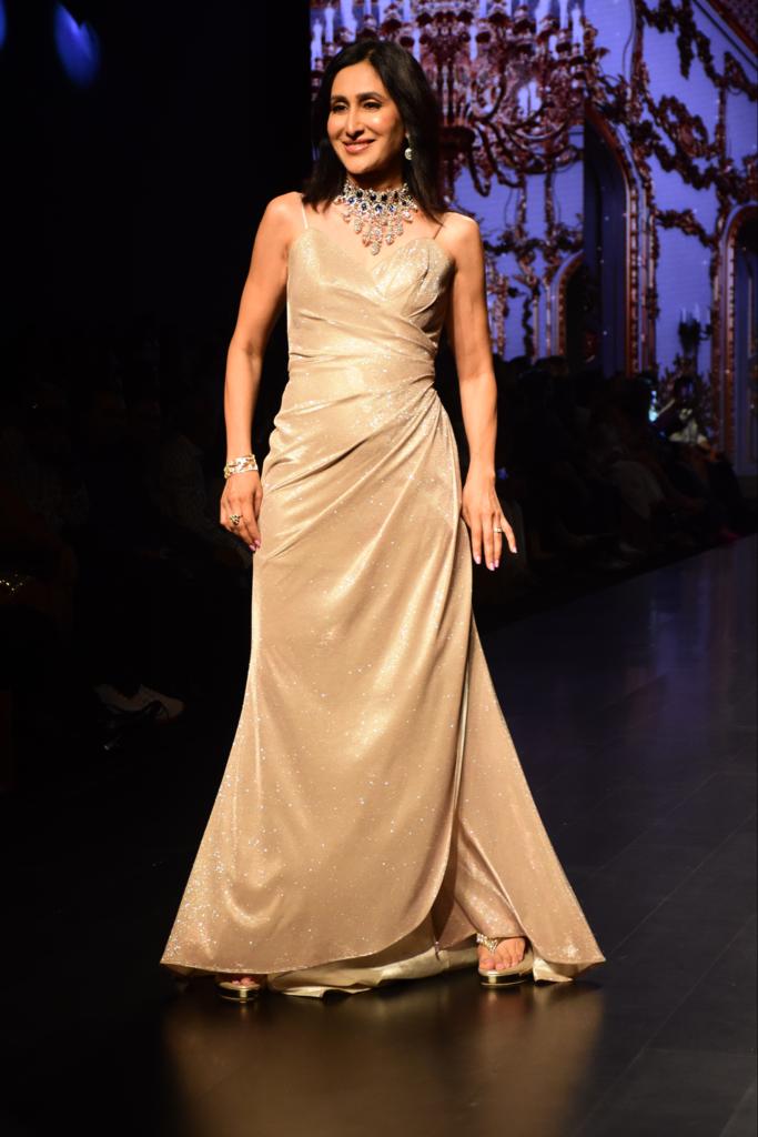 Teejay Sidhu looks elegant in a silk gown. 