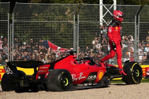 Ferrari driver Charles Leclerc of Monaco steps off his car after running off the track in the first lap during the Australian Formula One Grand Prix at Albert Park in Melbourne, Sunday, April 2, 2023. (AP Photo/Scott Barbour)