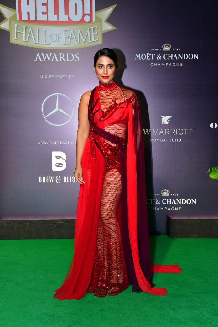 Hina Khan oozes oomph in red mesh dress at Hello! Hall of Fame Awards 2023.