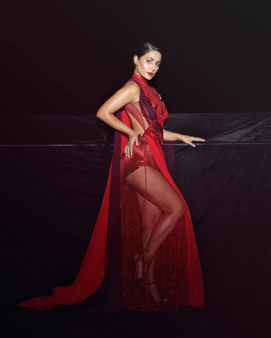Hina Khan strikes a pose in the red dress by Gavin Miguel. 