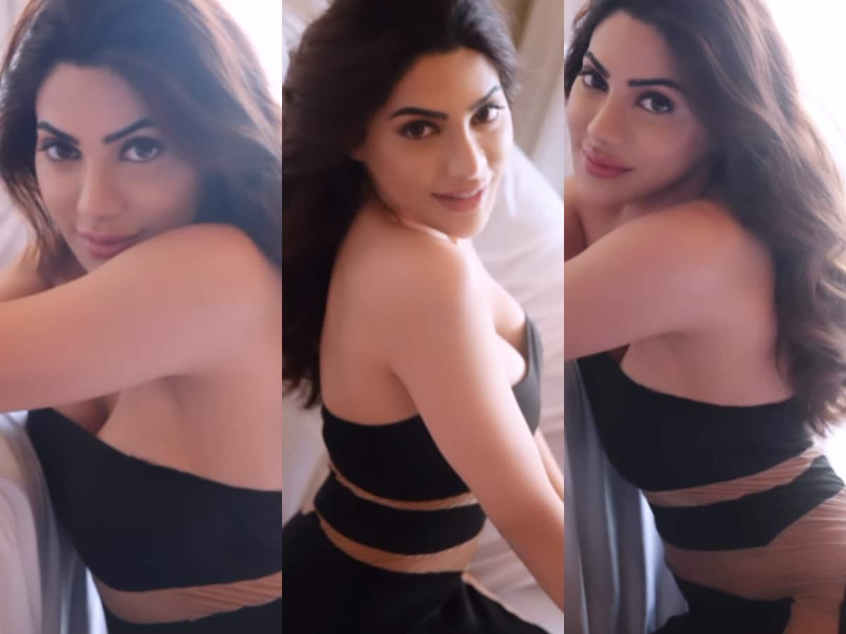 HOT! Nikki Tamboli Goes Bold As She Poses in Bed Wearing See-through Dress  for Sexy Video; Watch - News18