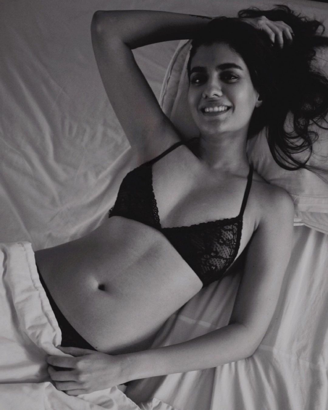 Shreya Dhanwanthary displays her toned figure in black lingerie. 