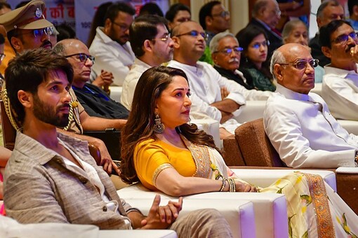 (From left) Actors Shahid Kapoor and Governor Ramesh Bais listen to the 100th episode of PM Modi's Mann Ki Baat, in Mumbai, on Sunday. (PTI)