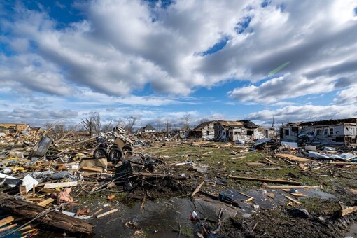 Damage from a late-night tornado is seen in Sullivan, Ind., Saturday, April 1, 2023. Multiple deaths were reported in the area following the storm. (AP Photo/Doug McSchooler)