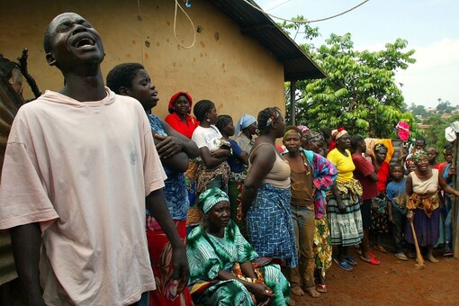 Relatives mourn the death of a suspected Marburg virus victim in the northern Angolan town of Uige. (Reuters)