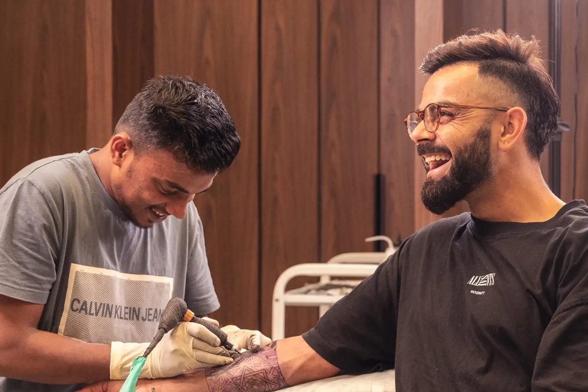 What are the meanings behind Virat Kohli's tattoos?