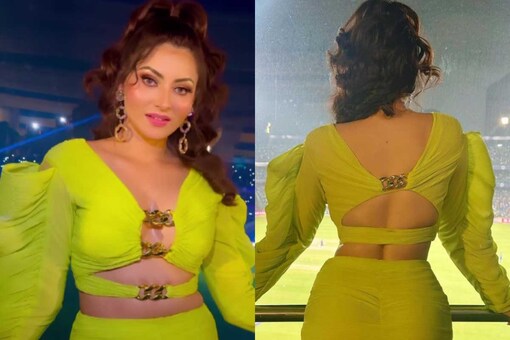 Urvashi was looking stylish in a lemon green bodycon dress.