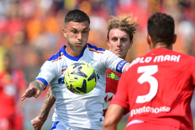 Lecce's Gabriel Strefezza eyes the ball as Monza's Pablo Mari looks at him, during the Serie A soccer match between Monza and Lecce at the U-Power stadium in Monza, Italy, Sunday, May 28, 2023. (Claudio Grassi/LaPresse via AP)