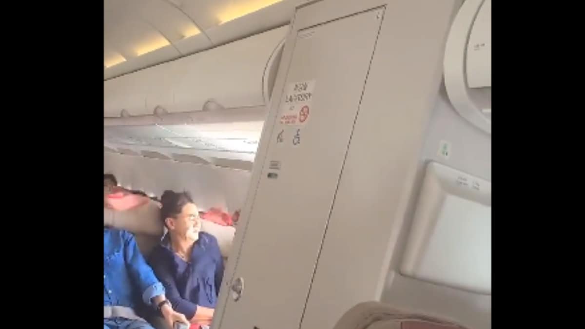 Mid-Air Nightmare: Plane Shocks Passengers as Emergency Exit Door Flies Open | WATCH